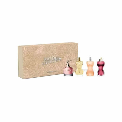 Set of four Jean Paul Gaultier Feminine miniatures, 6ml bottles, from Jag Couture London and New York.