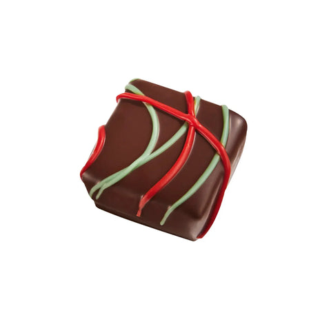 Joseph salted caramel ganache in dark chocolate, 11.5g, from Jag Couture London New York, shown in a close-up image.