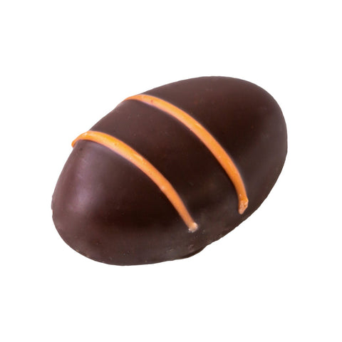Orange fondant cream enrobed in dark chocolate with orange stripe decoration, 10g, by Jag Couture London - New York.
