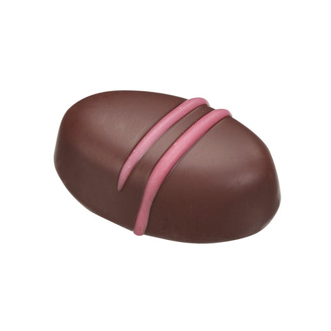 Strawberry fondant cream enrobed in dark chocolate, 10g, by Jag Couture London New York, close-up of glossy, rich dessert confection.