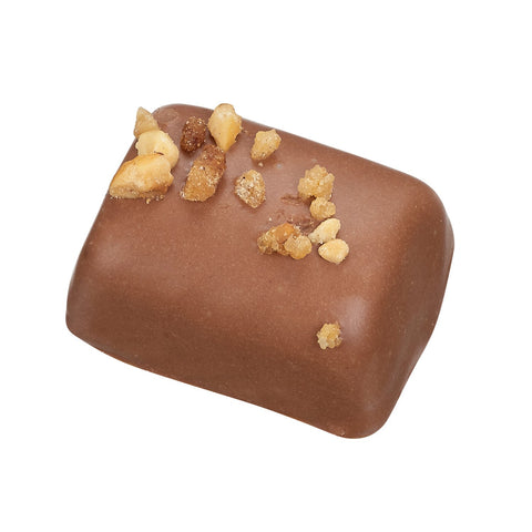 Milk chocolate with rhubarb cream in a 14g Rhubarb Crumble by Jag Couture London - New York, shown in the image.