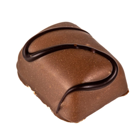 Peanut crunch praline in milk chocolate, 14g by Jag Couture London New York, showing a close-up of the chocolate-coated peanut treat.