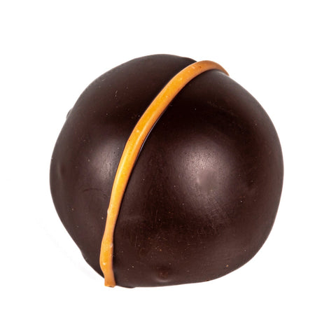 Bucks Fizz chocolate truffle with Marc de Champagne and orange crème in dark chocolate, by Jag Couture London - New York.