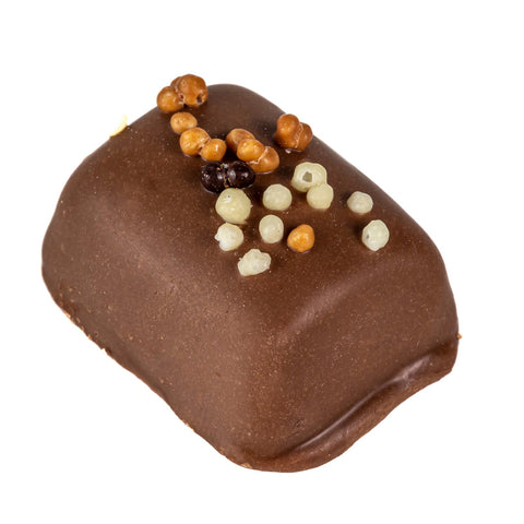 Hazelnut praline in milk chocolate praline by Jag Couture London, crunchy texture and rich flavor, 14g.