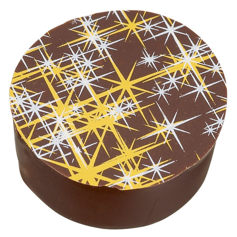 Dark chocolate filled with Hot Toddy whisky, lemon, and cinnamon, by Jag Couture London - New York.
