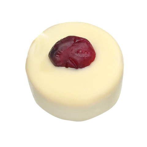 Jag Couture London New York Port & Cranberry chocolate ganache in white chocolate, featuring cranberries and rich port flavor.