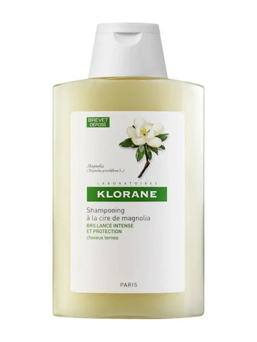 Klorane Brightening and Protection Shampoo with Magnolia Wax, 200ml, featuring a sleek bottle with a pump dispenser.