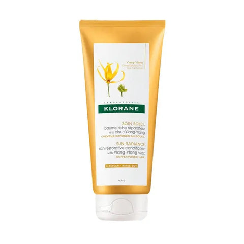 Klorane Enriched Repair Balm with Ylang-Ylang wax in 100ml jar, featuring smooth balm texture and natural floral scent.