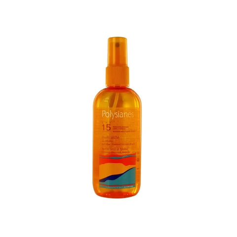 Klorane Polysianes Dry Oil SPF 15 in a 150ml bottle, with golden liquid and spray nozzle, outdoors on a sunny day.