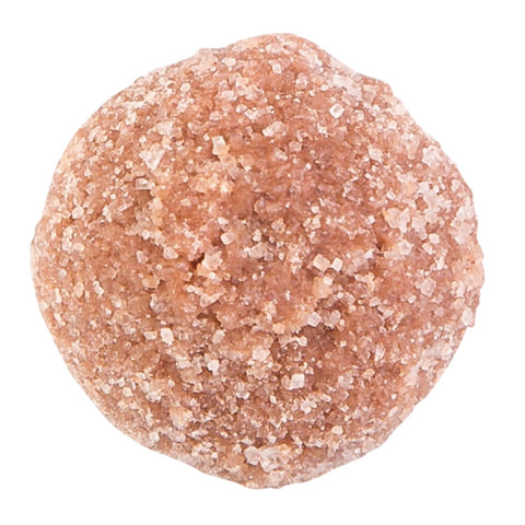 Milk chocolate caramel truffles by Jag Couture London, coated in sugar with a smooth caramel center, shown in the image.