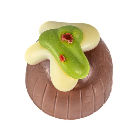 Milk chocolate Christmas pudding with holly decoration, spiced center, from Jag Couture London, 12g single piece, approx 860g total.