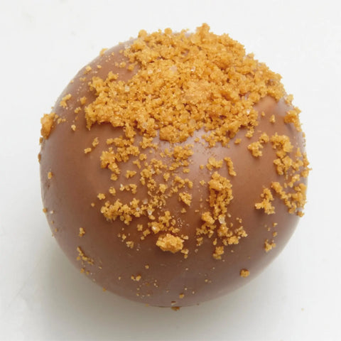 Lenart milk chocolate with spiced biscuit praline, 15.2g, by Jag Couture London and New York, shown in close-up.