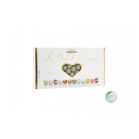 Les Perles Summer Vert by Jag Couture London features toasted hazelnuts in dark and white chocolate with green sugar coating.
