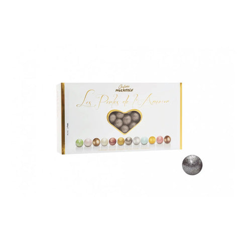 Les Perles Winter Argent by Jag Couture London features toasted hazelnuts in dark chocolate with silver-colored sugar decoration.