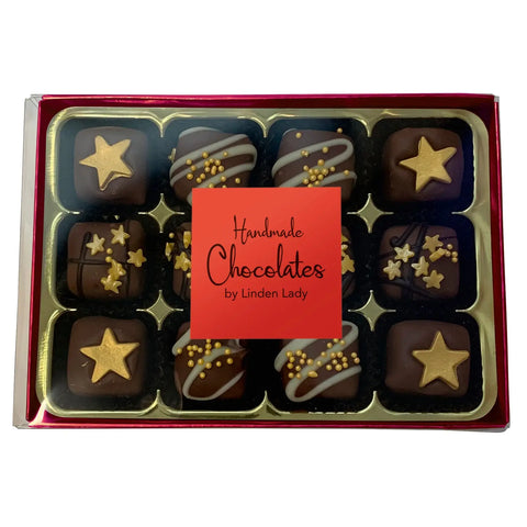 Linden Lady 12 chocolate-covered fudge pieces in a long red box with a clear cello lid, by Jag Couture London New York.