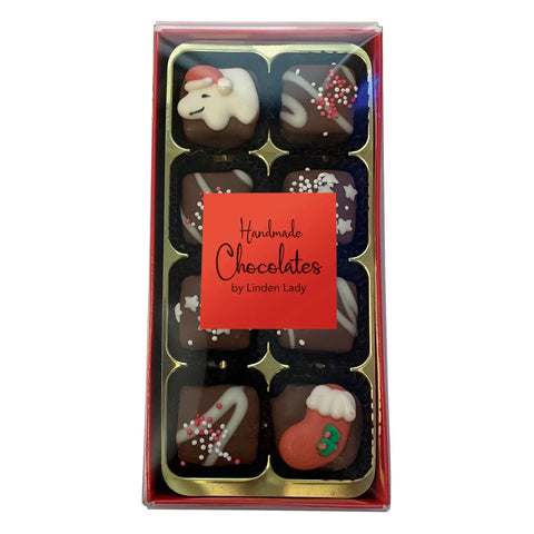 Linden Lady 8 chocolate-covered fudge pieces in a long red box with a clear cello lid, by Jag Couture London New York.