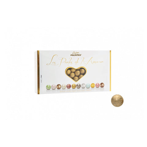 Les Perles Winter Golden by Jag Couture London features toasted hazelnuts in dark chocolate with gold-colored sugar coating.