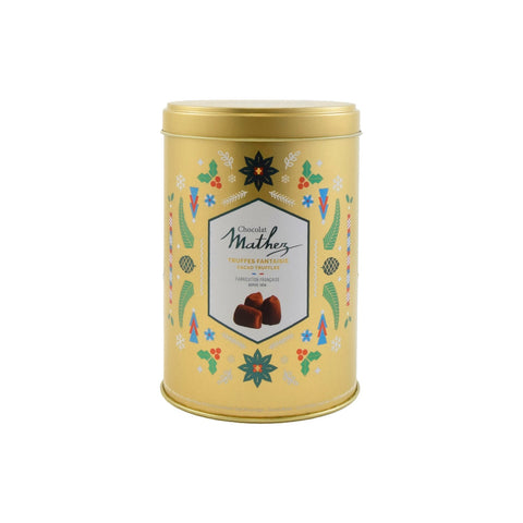 French cocoa dusted truffles in a gold Christmas tin by Jag Couture London New York, featuring elegant holiday packaging.