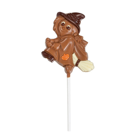 Solid milk chocolate happy witch lolly from Jag Couture London - New York, decorated with colorful details and festive design.