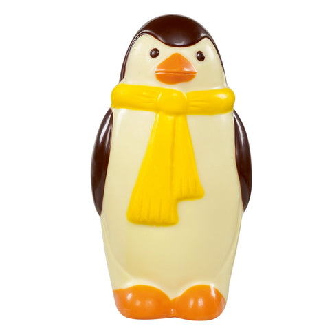Hollow white chocolate penguin decorated with colorful accents, 15cm tall, by Jag Couture London New York.