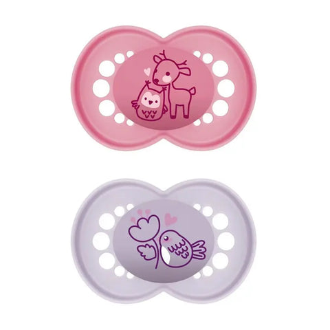 Two Mam Original Pure Silicone Pacifiers for 6 months and older in pink and purple, designed for comfort and safety.