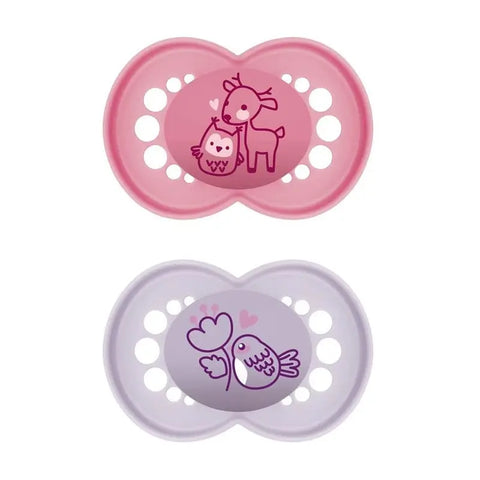 Two Mam Original Pure Silicone Pacifiers for 6+ months in pink and purple, displayed in a close-up image.