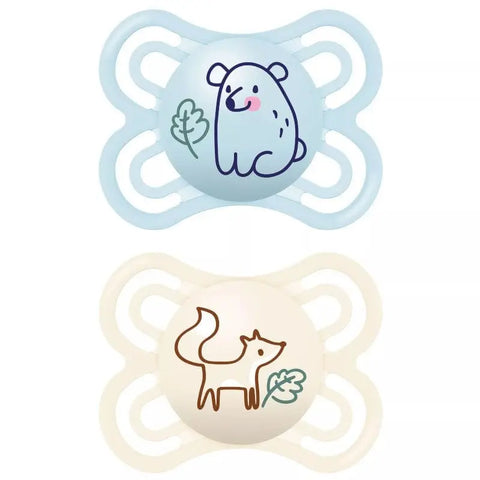 Two blue Mam Perfect pacifiers for 2-6 months from Jag Couture London New York, shown in a close-up image.