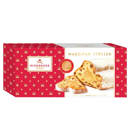 Marzipan stollen fruit loaf with marzipan filling, from Jag Couture London New York, showcasing a sliced fruit and marzipan-filled bread.