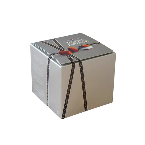 Mathez French cocoa dusted truffles in a silver cube box, presented by Jag Couture London New York.