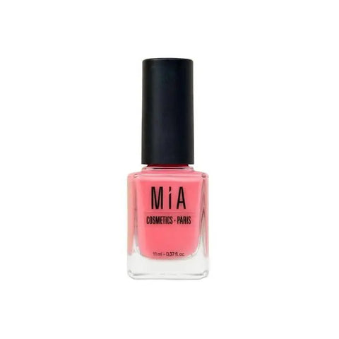 Vía Cosmetics Dahlia Blossom nail polish by Jag Couture London New York, showing a vibrant pink nail polish bottle with floral design.