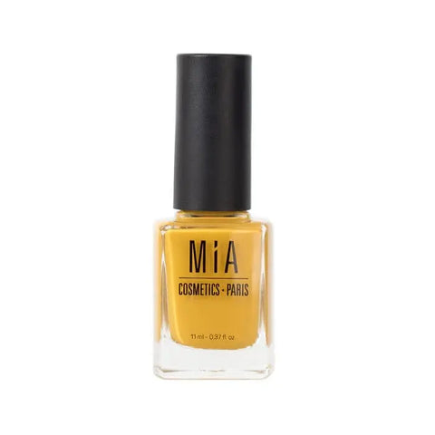 Mía Cosmetics Dandelion nail polish bottle from Jag Couture London New York, with bright yellow nail polish visible in the image.