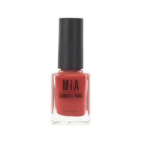 Mía Cosmetics Ginger nail polish bottle from Jag Couture London-New York with vibrant orange nail polish color.