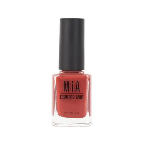 Mía Cosmetics Ginger nail polish bottle from Jag Couture London-New York, with vibrant orange hue and sleek packaging.