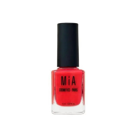 Mía Cosmetics Juicy Strawberry nail polish bottle with bright red polish, by Jag Couture London New York on a white background.