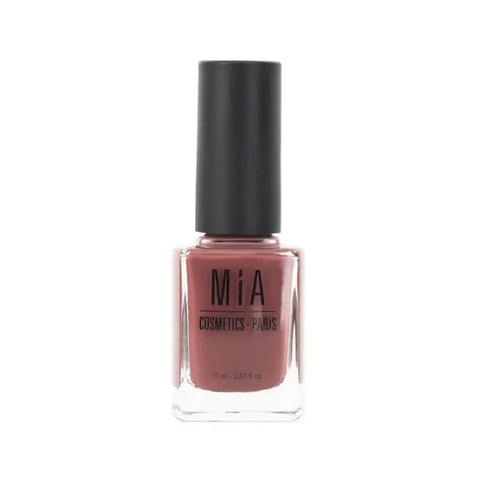 Mía Cosmetics terracotta nail polish bottle from Jag Couture London New York, with vibrant orange-brown color and sleek design