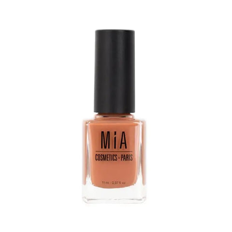 Close-up of Mía Cosmetics Toffee nail polish bottle by Jag Couture London New York with the polish color visible.