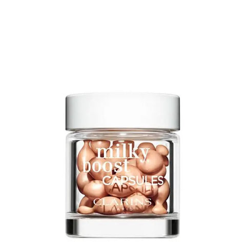 Milky Boost Fond De Teint 3.5 by Jag Couture London - New York, 30 capsules in a sleek container with product branding visible.