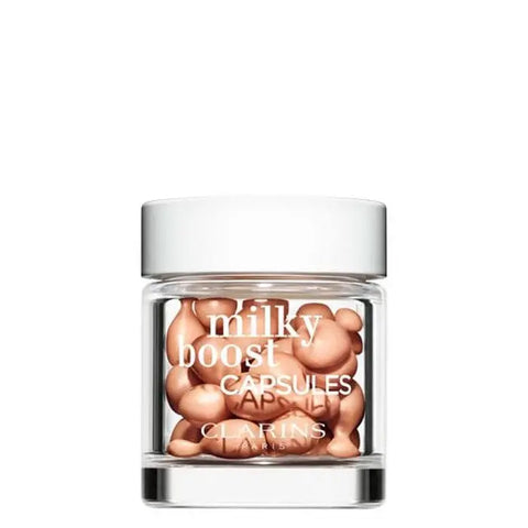 Milky Boost Fond De Teint 5 by Jag Couture London - New York, shown in a clear capsule bottle with 30 capsules and product label.