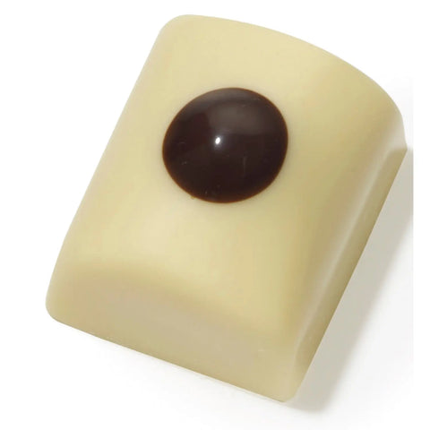 White chocolate with vanilla-flavored ganache from Jag Couture London in a 15g package, featuring elegant packaging and a smooth surface.