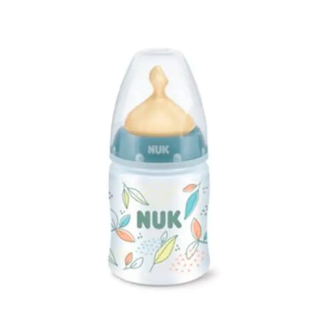 Nuk baby bottle 150ml for 0-6 months by Jag Couture London New York, featuring a clear plastic body and silicone nipple.