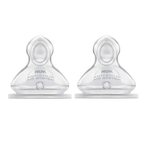 Two Nuk First Choice Size 2 silicone teats shown, designed for baby bottles, by Jag Couture London New York.