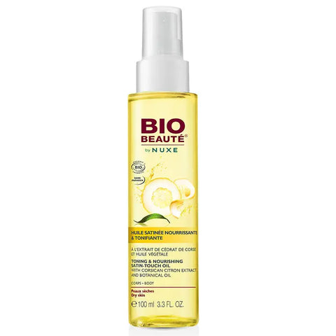 Nuxe Bio Beauté Toning and Nourishing Satin-Touch Oil 100ml, featuring a sleek bottle with a gold cap and silky texture.