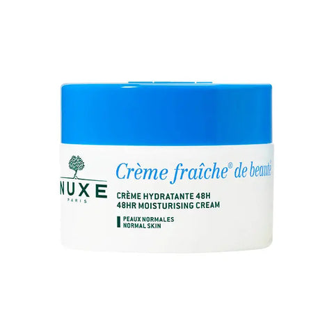 Nuxe Crème Fraîche De Beauté moisturizing cream for normal skin in a 50ml jar, displayed with fresh skincare ingredients.