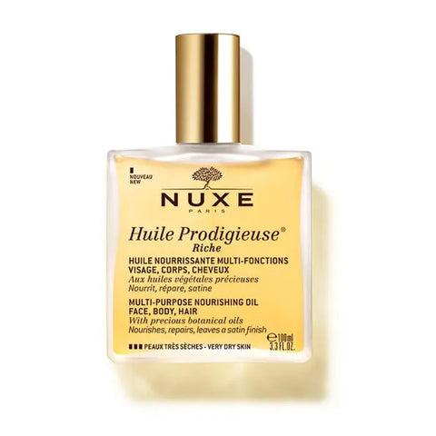 Nuxe Huile Prodigieuse Riche nourishing dry skin oil in a 100ml bottle, displayed with elegant packaging and dropper.