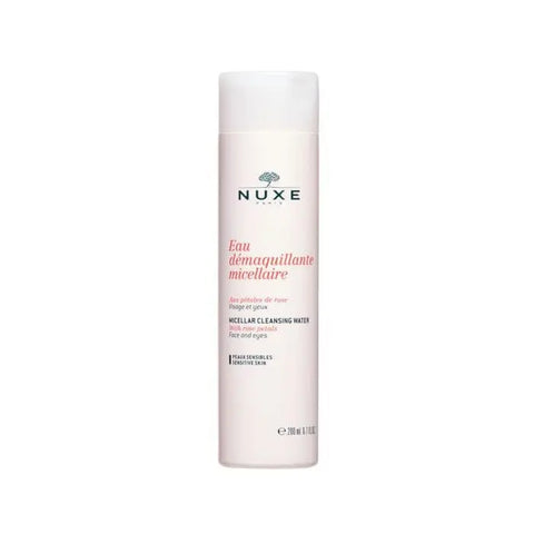 Nuxe Petales De Rose micellar cleansing water with rose petals in a 200ml bottle, displayed with a rose flower on a white background.