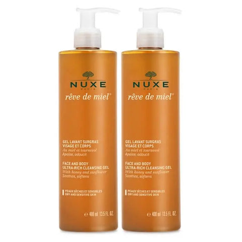 Nuxe Rêve De Miel face and body cleansing gel in two 400ml bottles, with gentle, hydrating formula for skin.