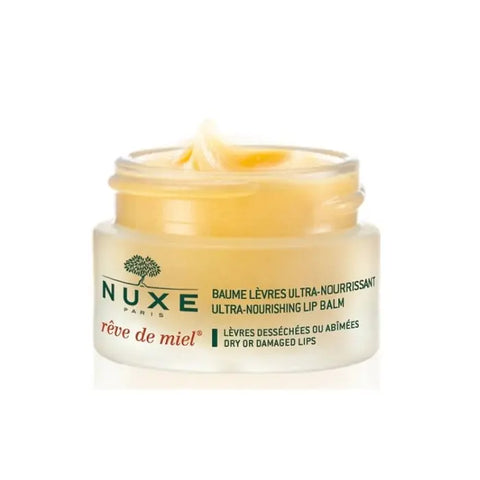 Nuxe Rêve De Miel Ultra Nourishing Lip Balm in 15g container, with golden lid and smooth balm visible in the image.