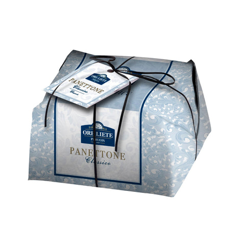 Hand-wrapped Ore Liete Panettone by Jag Couture London - New York, traditional Italian Christmas bread with golden crust and festive packaging.