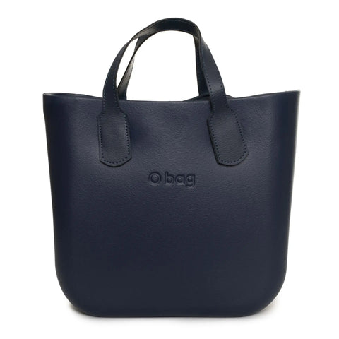 Obag X073 handbag by Jag Couture London New York, featuring a sleek black design with silver hardware and textured finish.