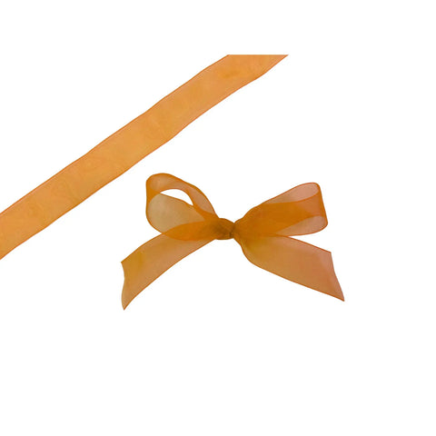 Old gold organza woven edge ribbon by Jag Couture London New York, showing detailed texture and elegant finish.
